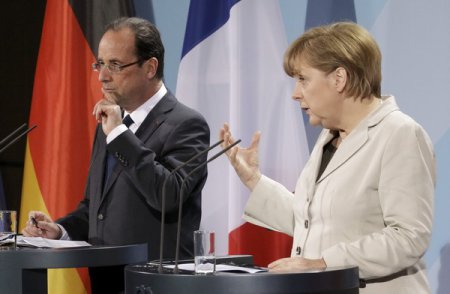 Олланд объяснил Меркель, что в ситуации на Украине наметился прогресс