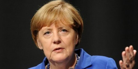 Меркель обвинила Турцию в злоупотреблении членством в международных организ ...