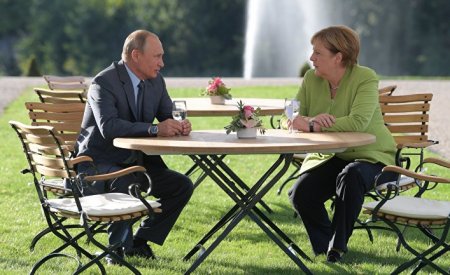 В беседе Меркель и Путина звучат прагматичные ноты